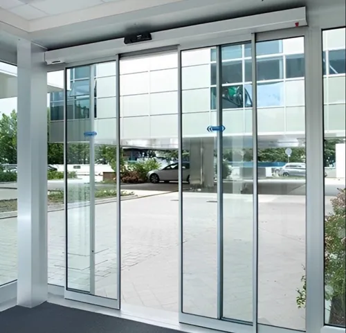 What motor type is the most durable and quiet for automatic doors?
