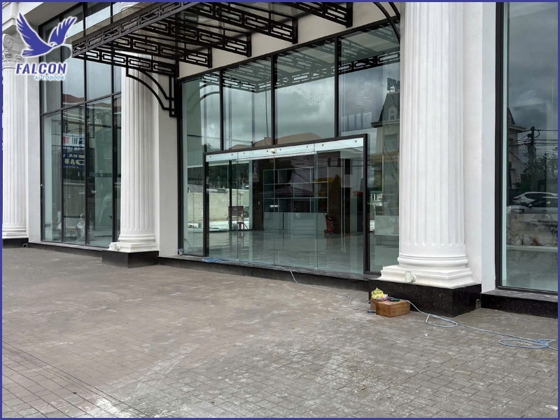 Why do automatic door maintenance costs increase over time?