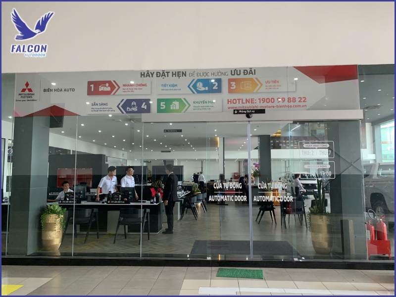 Why do automatic doors deteriorate faster in some buildings?